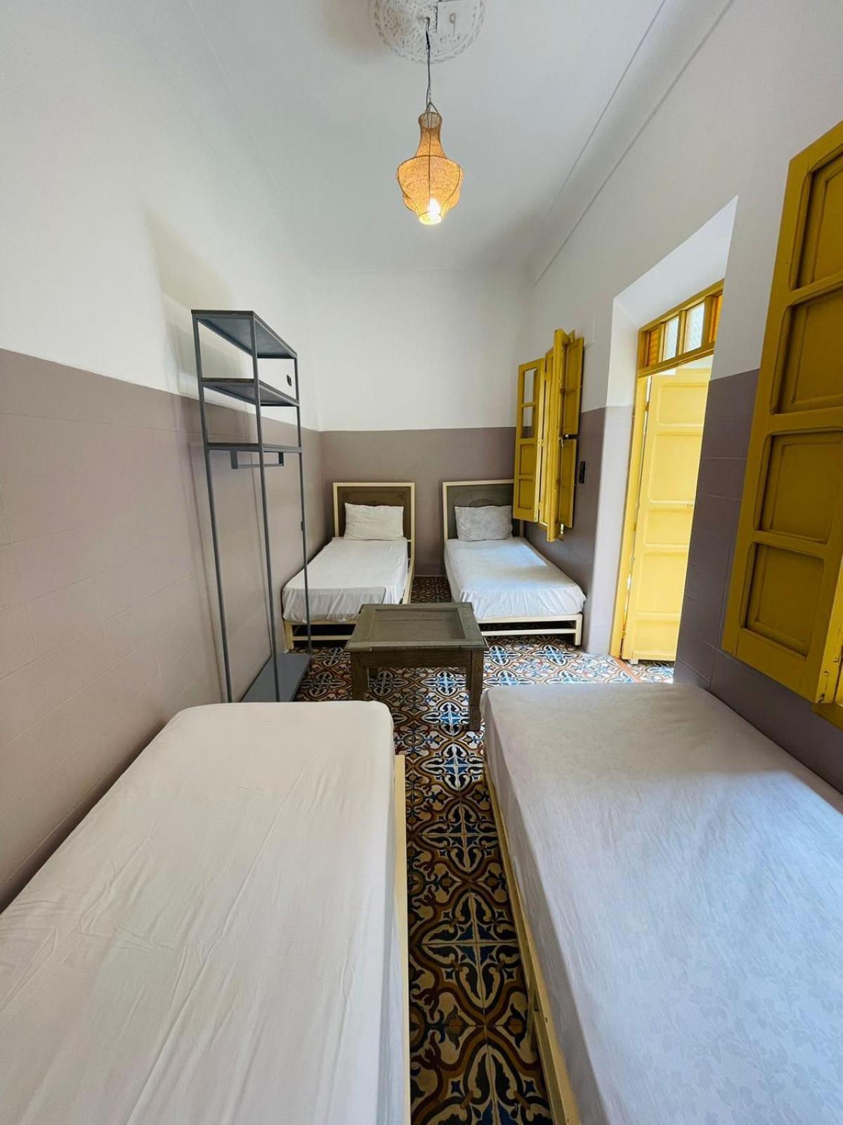 Chambre Quadruple Économique avec Salle de Bains Commune